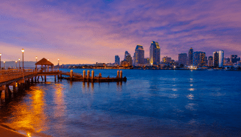 San Diego Skyline with cool toned hues and a bridge dock