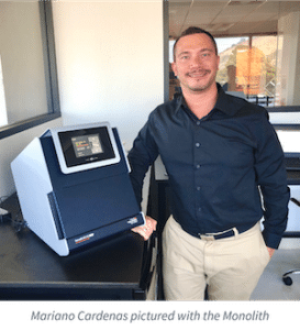 Mariano Cardenas Career lab posing with NanoTemper right view instrument