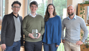Cyrill Brunner explorer award image with three other smiling people