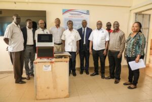Staff at Masinde Muliro University of Science and Technology accepting the new Prometheus instrument donated by NanoTemper Technologies.